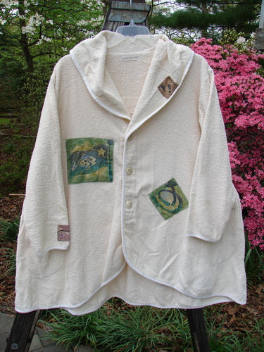 1996 Patched French Terry Cape Cod Coat Travel White Pine OSFA featuring a sweeping rounded A-line shape, two oversized front pockets, farm-themed patches, and a deep V-neck collar with rolled piping edges.