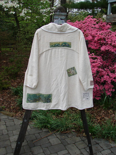 1996 Patched French Terry Cape Cod Coat Travel White Pine OSFA on rack; features oversized pockets, single button closure, deep V-neck collar, farm theme patches, Blue Fish patch, and rounded A-line shape.