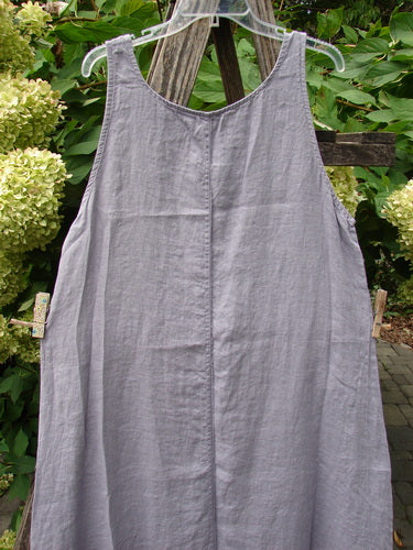 Barclay NWT Linen Sundress Garden Folly Amethyst Size 0: A sleeveless, loose-fitting dress with a rounded neckline and varying hemline, showcasing a garden-themed continuous paint design.