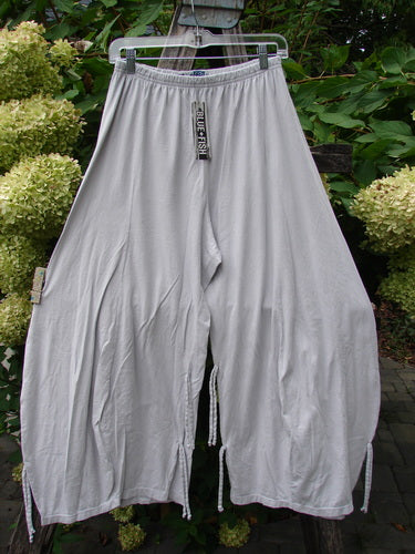 Barclay NWT Crop Billow Pant Unpainted Pearl Smoke Size 0 features loose-fitting, wide-leg design with elastic waistband and drawstring ankle ties, crafted from organic cotton for Blue Fish Clothing's unique vintage style.