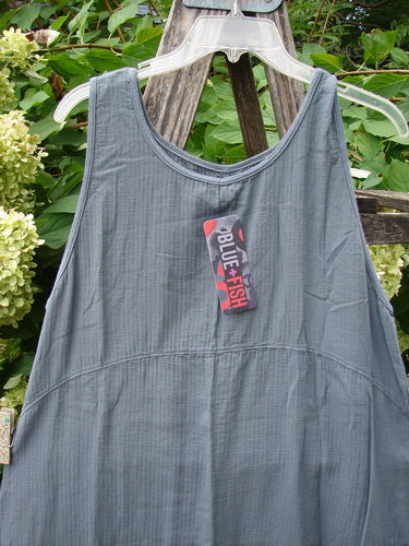 Barclay NWT Textured Salted Shift Unpainted Grey Diatom Size 0 on a hanger, showcasing its rounded neckline and varying hemline, embodying Bluefishfinder.com's creative, individualistic style.