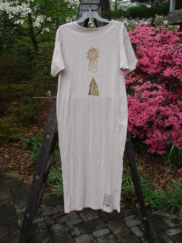 1996 Long Tee Dress Windy House Birch Bark Size 0 displayed on a clothes rack, features a rounded paneled neckline, short wide sleeves, and a seamless front and back design.