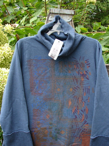 Barclay NWT Fleece Cowl Neck Sweatshirt Metallic Daisy Vintage Indigo Size 0, featuring a unique abstract print on the front, high funnel collar, and long sleeves, displayed on a wooden hanger.