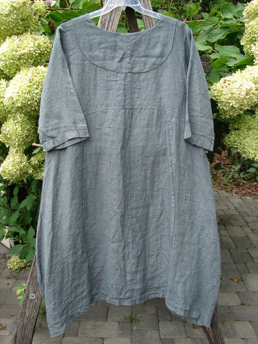 Barclay NWT Linen Cross Over Urchin Pocket Dress Vertical Rain Smudge Stick Size 0, featuring a loose fit, elbow-length sleeves, and a smart cross-over V-neckline, displayed on a clear plastic hanger.