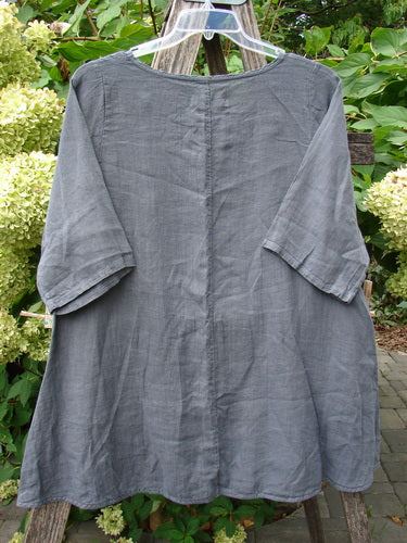 Barclay NWT Linen Lucida Top Unpainted Diatom Size 0, featuring a flowy A-line shape, elbow-length sleeves, and a round neckline, displayed on a hanger.
