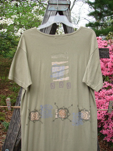 1996 Long Tee Dress Pathway Cricket Size 0 displayed on a hanger, featuring a rounded paneled neckline, short wide sleeves, and signature Garden Pathway Theme paint.