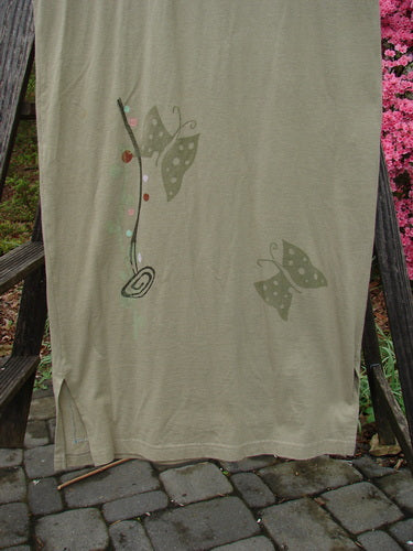 1996 Long Tee Dress Butterfly Cricket Size 0, featuring a white organic cotton fabric with butterfly designs, a rounded paneled neckline, short wide sleeves, and a vented hemline.