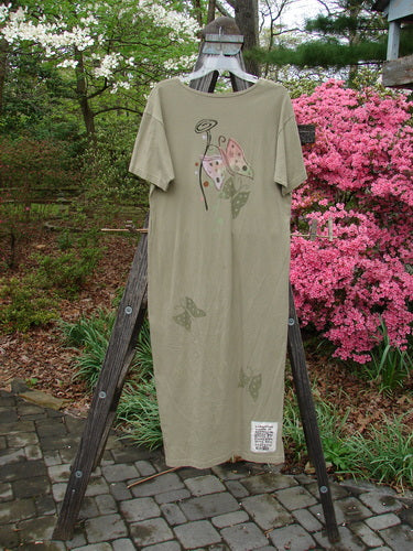 1996 Long Tee Dress Butterfly Cricket Size 0 displayed on a hanger, featuring a rounded neckline, short wide sleeves, and a classic butterfly theme with a Blue Fish patch.