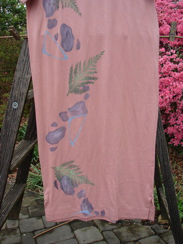 1996 Long Tee Dress Fern Stone Petal Altered Size 0, displayed on a ladder, showcasing its rounded neckline, seamless front and back, short wide sleeves, and longer length.