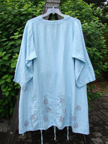 Barclay Linen Venetian Square Neck High Vent Tunic Dress Daisy Chain Water Size 2: A flowing blue dress with a square neckline and hourglass shape. Features include S-shaped seams, high vented sides, and draw cords.
