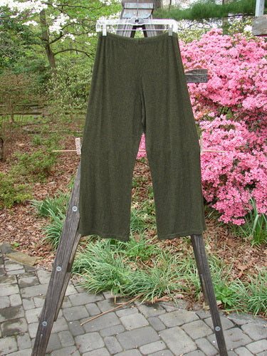 2000 Rayon Lycra Rib Flare Pant Unpainted Green Oak Heather Size 1 displayed on a ladder, showcasing its full elastic waistline, slightly flared bottom, and superior drape and fall.