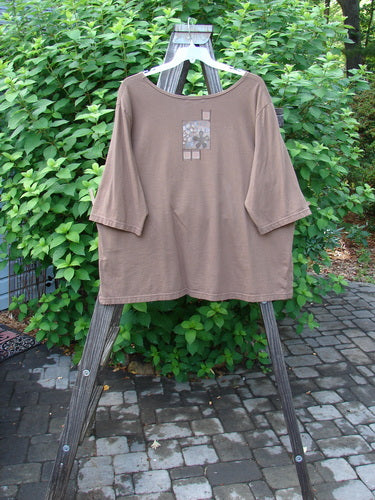 Barclay Short Sleeved Studio Tee Chem Study Mocha Size 3: A brown shirt with a square design, wider three quarter length sleeves, and medium vented sides.