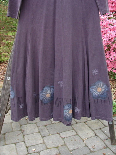 1998 Rib Top Dress Circle Floral Morado Size 1: A vintage purple dress with blue floral patterns, featuring a ribbed upper bodice, empire waist, and a flowing lower section.