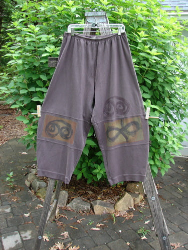 2000 Interlock Moors Pant Celtic Peat Size 2, featuring a full elastic waistband and a unique rounded, pegged lower shape with mid-leg bell, sectional panels, and Celtic theme paint.