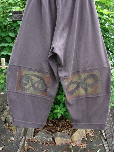 2000 Interlock Moors Pant Celtic Peat Size 2 featuring a unique pegged shape, mid-leg bell, and Celtic-themed paint, crafted from dense heavyweight cotton with a replaceable elastic waistband.