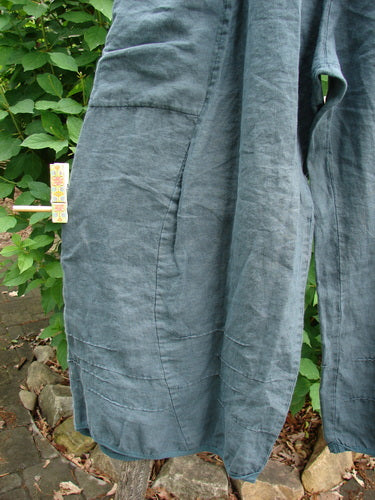 Barclay Linen Flutter Top Cargo Pant Unpainted Tealsa Size 1, featuring a thick elastic waist, curved panels, and side pockets, embodies Bluefishfinder.com's vintage style with a relaxed, billowing silhouette.