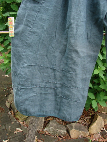 Barclay Linen Flutter Top Cargo Pant Unpainted Tealsa Size 1, featuring a full elastic waistline, billowing fall, curved panels, dimensional widening lowers, and inseam side pockets, ideal for versatile spring styling.