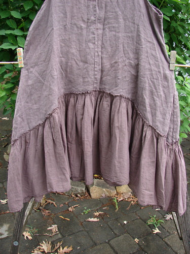 Barclay Linen Batiste Summer Frock Jumper in Floral Grid Rosewood, featuring a gauze bodice, batiste lower flounce, oval neckline, deep pockets, and deep arm openings, from BlueFishFinder.com.