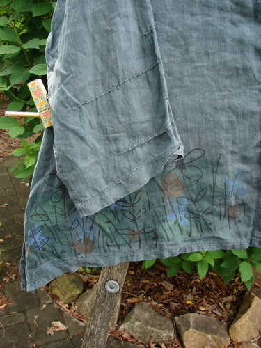 Barclay Linen Tiny Button Dip Side Cardigan Daisy Field Green Mineral Size 0 features a deep V-neckline, textured shiny buttons, three-quarter sleeves, and a vented hem, embodying Bluefishfinder.com's vintage aesthetic.