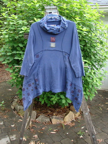 Barclay Patched Thermal Reverse Stitch Pocket Dress Royal Blue Size 0 features a cowl neck, exterior stitchery, sectional panels, and flutter hemline, with distinct painted patches, offering a unique, artistic design.