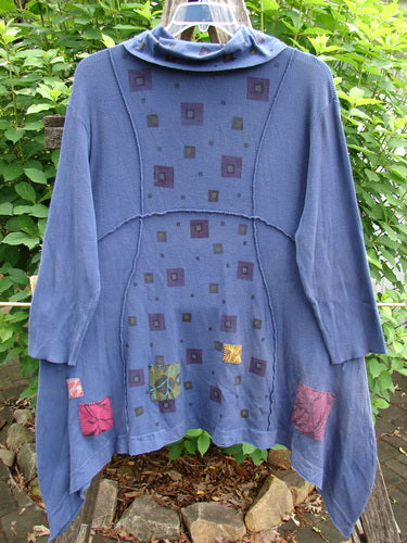 Barclay Patched Thermal Reverse Stitch Pocket Dress in Royal Blue, featuring a cowl neck, exterior stitchery, flutter hemline, and painted patches, exemplifies BlueFishFinder's vintage style and creative individuality.