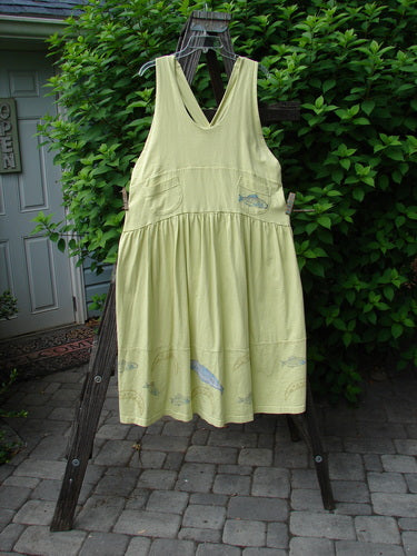Image alt text: "1999 NWT Tadpole Jumper dress with adjustable shoulder straps, sweeping hemline, criss-cross lower back, and round bottomed pockets"