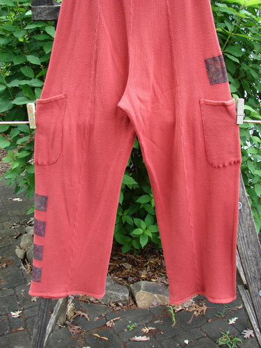 Barclay Thermal Patched Pottery Pant Leaf Sienna Size 1 features a full elastic waist, vertical stitching, painted leaf patches, deeper pockets, and a tapered design, reflecting the creative, vintage BlueFishFinder style.