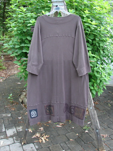 2000 Interlock Glassgow Coat Dress Continuous Celtic Peat Size 0 features oversized buttons, a heavy painted bottom panel, V-shaped neckline, and Celtic theme paint, offering a wide, swingy silhouette.