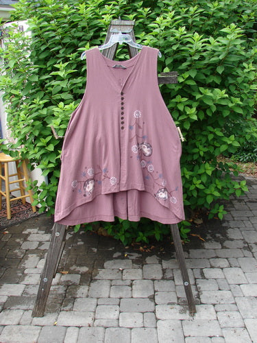 1996 Moonsmile Vest: Swingy and flirtatious piece with tiny buttons, V neckline, A-line shape, curved hemline, side seam pockets, painted rear tab. Adorned in a continuous daisy chain theme with ladybug accents. Bust 50, Waist 56, Hips 60.