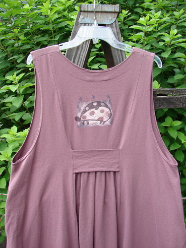 1996 Moonsmile Vest with ladybug accents. Swingy shape, V neckline, curved hemline. Organic cotton. Bust 50, waist 56, hips 60.
