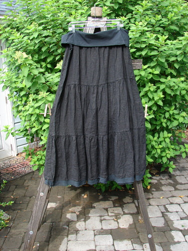 Barclay NWT Linen Fold Over Three Tier Skirt, black, size 2, on clothes rack. Triple tiers, frayed hem. 38" length.
