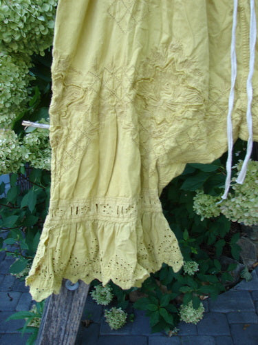 Magnolia Pearl NWT Embroidered Khloe Bloomer Golden Daffodil OSFA showcases intricate geometric and floral embroidery on European cotton, featuring scalloped eyelet-lace ruffles, embodying Bluefishfinder.com's vintage and expressive style.