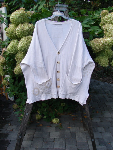 1997 Thermal Voyage Roadside Jacket Windy Floral Shell OSFA features a relaxed off-white V-neck cardigan with five wooden buttons, two oversized front pockets, drop shoulders, and vented sides, perfectly capturing vintage Blue Fish style.