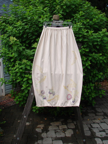 Image alt text: Barclay Little Lace Trim Skirt on Wooden Stand, Sweet Garden Folly Theme Paint, Laced Hem Circumference