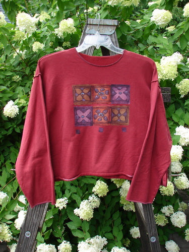 1997 Long Sleeved Boxy Top with Flower Grid Pattern, Size 2. A wide, slightly A-lined red shirt with whip stitching and drop shoulders.