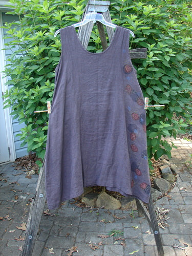 Barclay Linen Pocket Pinafore Polka Dot Plum Oversized Size 0 displayed on a clothesline, showcasing its A-line flair, scoop neckline, and exterior polka dot pockets, embodying Bluefishfinder.com's vintage, expressive style.