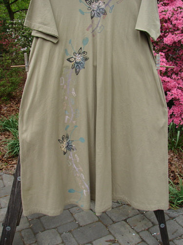 Vintage 1996 Spring Laughter Dress by Seedling, Size 2, featuring an abstract daisy and moon design. Organic cotton, wide neckline, oversized pockets, pleated back, A-line silhouette. Perfect for creative self-expression.
