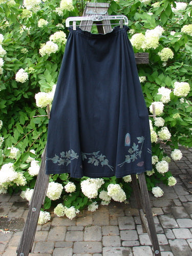 1993 Sweep Skirt Fall Leaves Black Size 1: A full swing skirt with a floral design and a ruffled waist.