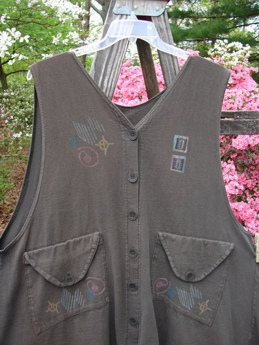 Vintage 1994 Love Letter Vest with Ginger Pot Patch on Edo Black fabric, OSFA. Features: Enveloped pockets, A-line shape, Blue Fish buttons. From BlueFishFinder's collection of unique, expressive vintage Blue Fish Clothing.