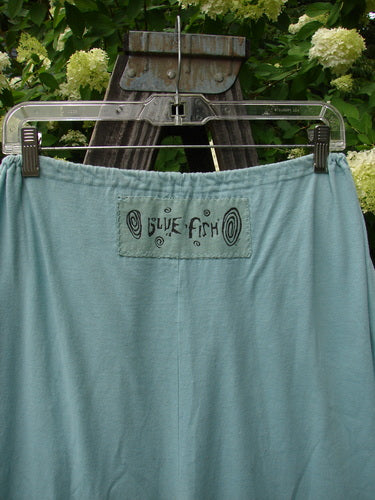1992 Pantaloon Unpainted Blue Tourmaline OSFA: Midweight cotton pants with antique lace and silk ribbon accents on clothes rack.