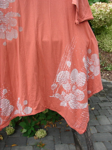 Barclay NWT Origami Tunic Top Berrie Patch Orange Cachi Size 0 features a handkerchief hem, stippled floral print, and raw flutter edges, exemplifying Bluefishfinder.com’s vintage, creative style.