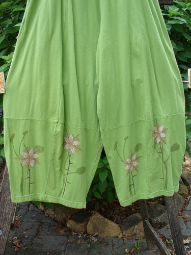 Barclay 4 Square Pant Floral Reach Spearmint Size 0 features a unique 3D diamond drape from the knee down, floral print, pocketed design, and full elastic waistband, embodying BlueFishFinder's creative vintage style.