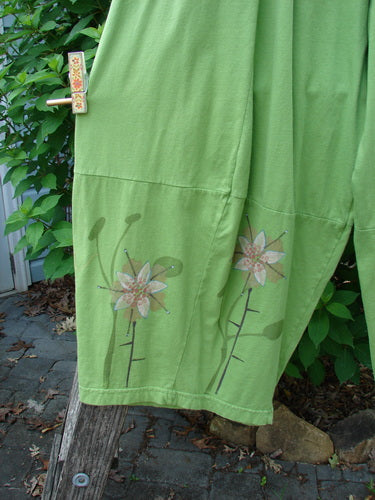 Barclay 4 Square Pant Floral Reach Spearmint Size 0 showcasing unique 3D diamond drape from knee down, floral pattern, full elastic waistband, pockets, and mid-weight organic cotton texture.