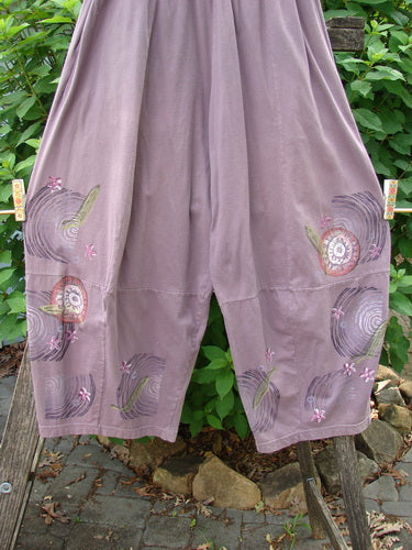 Barclay 4 Square Pant Spin Wind Dusty Plum Size 0 showcasing a unique 3D diamond drape from knee down, generous spin wind paint, pockets, and elastic waistband, crafted from mid-weight organic cotton.