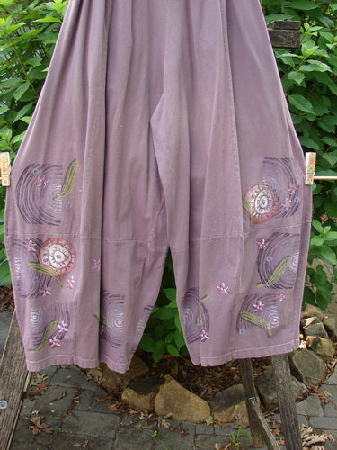 Barclay 4 Square Pant Spin Wind Dusty Plum Size 0, showcasing a unique 3D diamond drape from the knee, with an elastic waistband and pockets, highlighting mid-weight organic cotton texture.