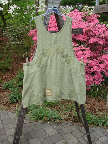 A vintage 1998 Botanicals Leafhopper Jumper apron in heavy linen from BlueFishFinder. Nature-themed with double-paneled waist, bib-style neckline, and painted details. Oversized, one-size-fits-all piece with unique charm.