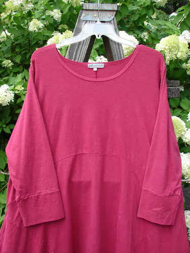 Barclay Cotton Lycra Igloo Tunic Dress in Hollyberry, size 2. A pink shirt on a swinger with a sweeping lower hemline and drop side pockets.