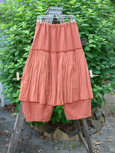Barclay Hemp Linen Batiste Fusion Pant Skirt Autumn Harvest Size 0, featuring a full elastic waist, triangular patches, and double tie accents, displayed on a clothesline.