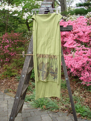 Barclay Sectional Wrap Scarf featuring Forest Leaf design in Peapod green. Organic cotton, rolled edges, sectional seams, versatile styling. Measures 20W x 75L. Perfect for expressing individuality. From BlueFishFinder.com.