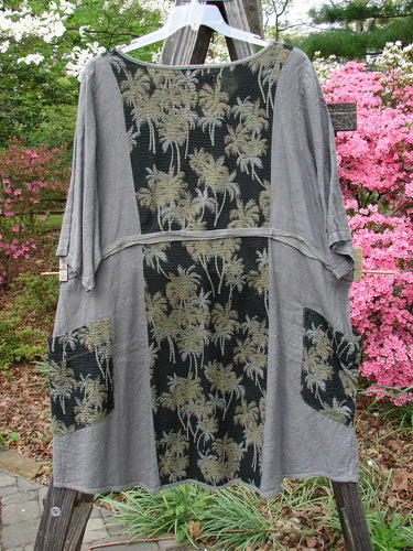 Barclay Linen Pucker Accent Urchin Dress featuring a Tropical Palm Print, Deep V Neckline, Drop Wrap Pockets, A-Line Shape, and Wide Sleeves. Vintage Blue Fish Clothing from BlueFishFinder.com.